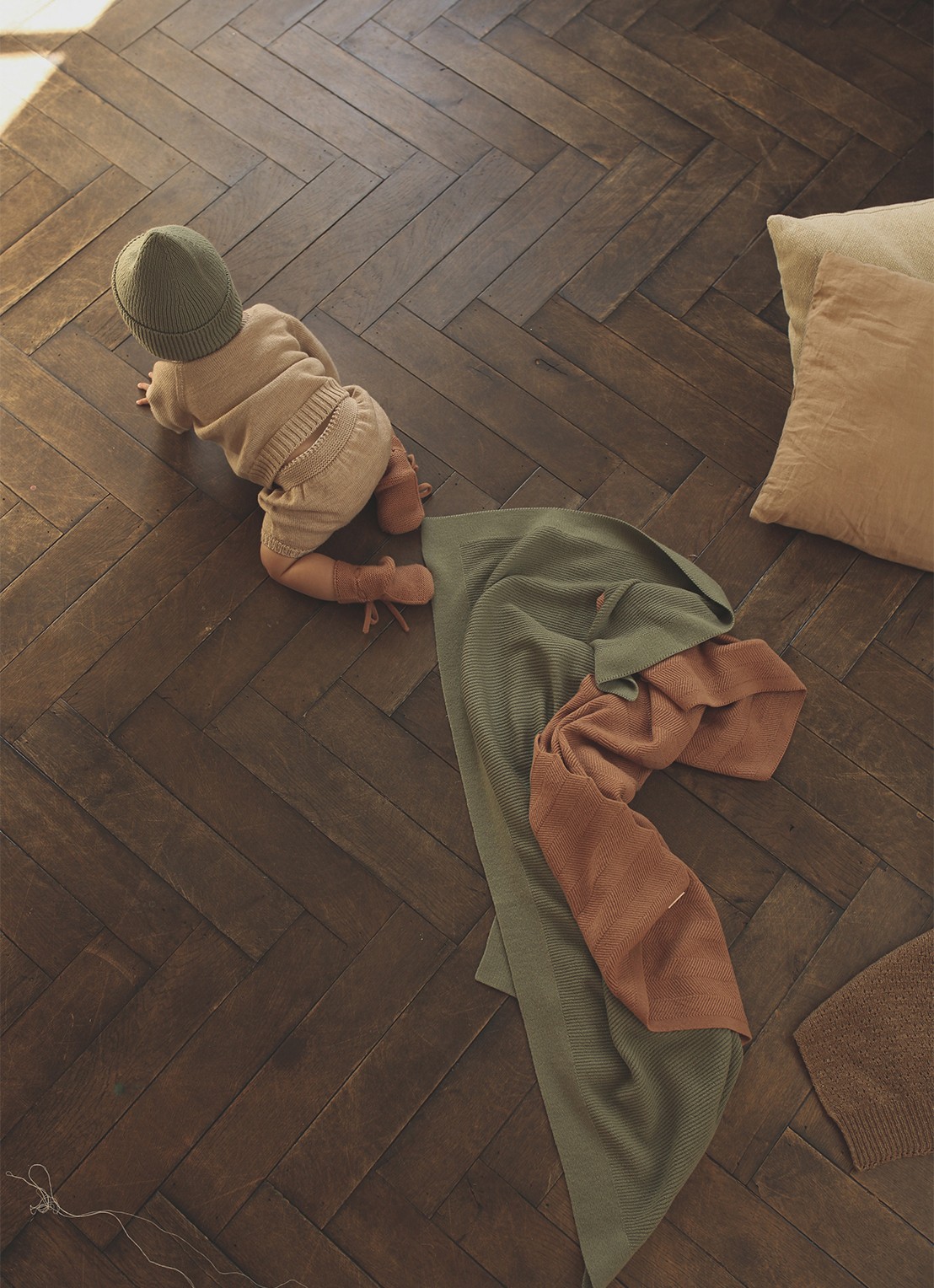 Hvid Gust wiegdeken van merino wol 70 x 95 cm - voorkant taupe