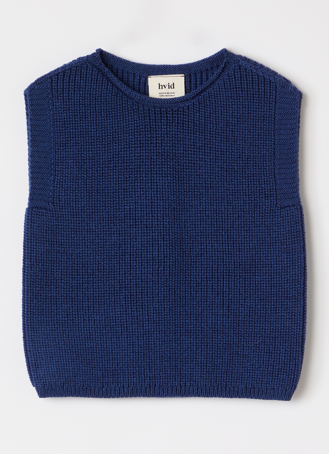 Hvid Harvey grofgebreide spencer van merino wol - voorkant donkerblauw