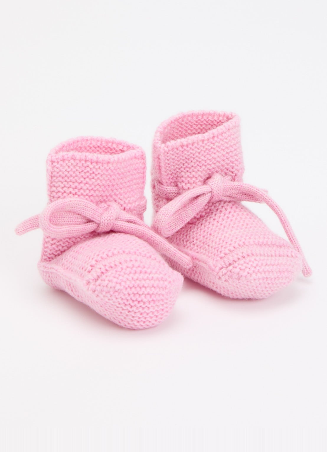 Hvid Original Booties babyslofje met strikdetail - voorkant lichtroze