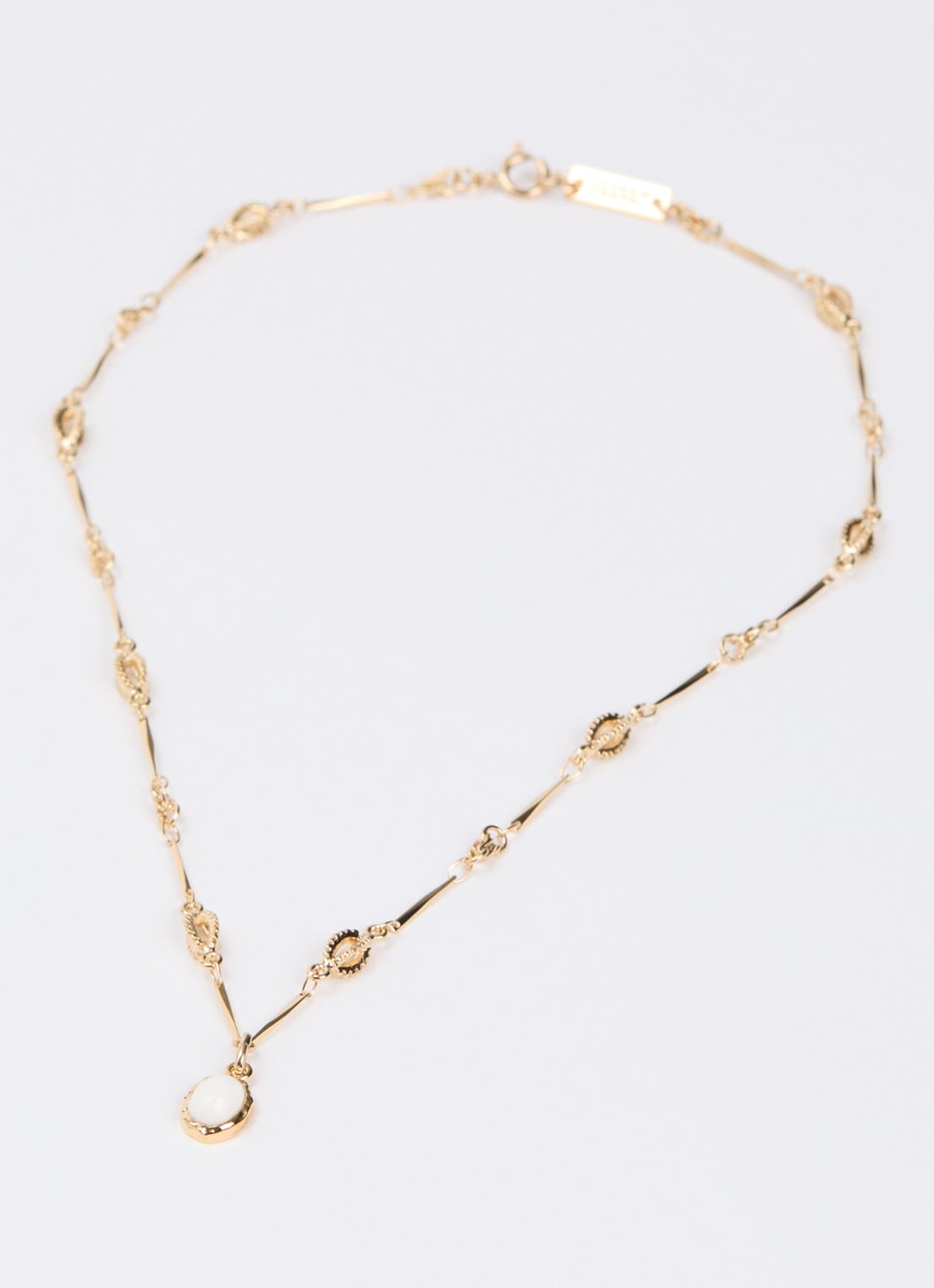 Isabel Marant Joanne ketting met hanger - detail gebroken wit