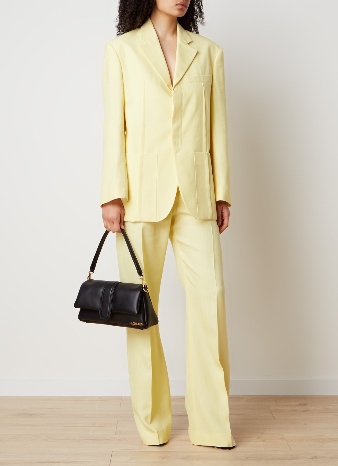 Jacquemus Sauge high waist flared fit pantalon met steekzakken - voorkant 2 lichtgeel