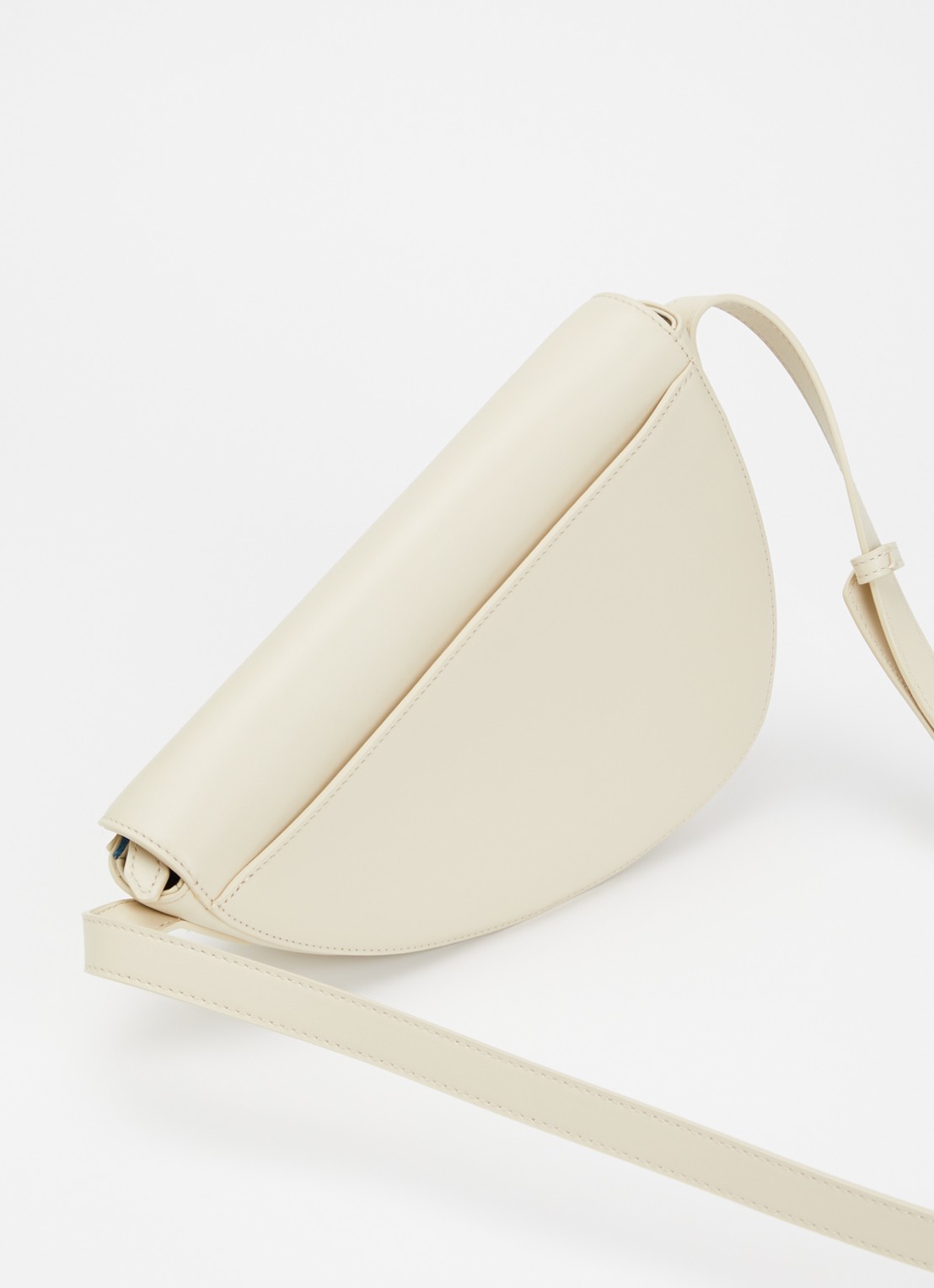 KAAI Rebel crossbodytas van leer - achterkant creme