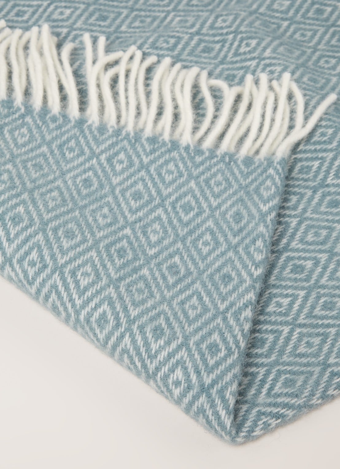 Klippan Stella plaid van lamswol 130 x 200 cm - detail zeegroen