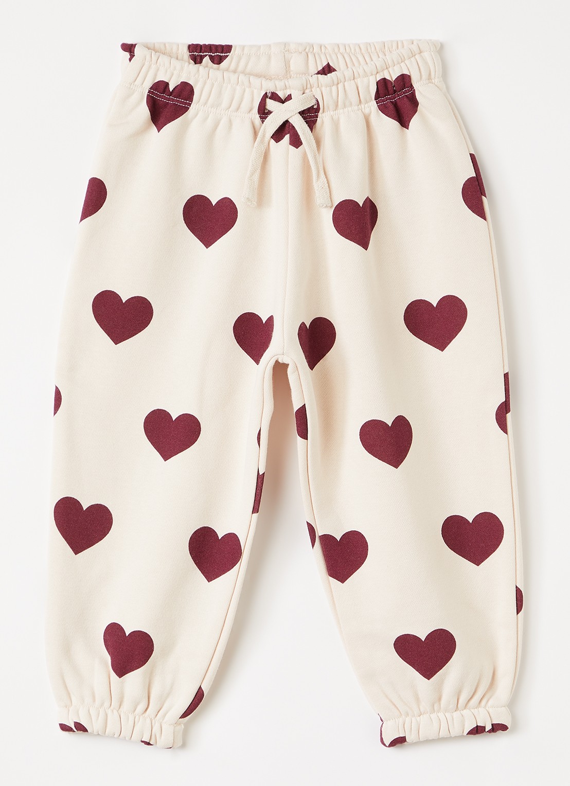 Konges Sløjd Lou tapered fit joggingbroek met print - voorkant lichtroze