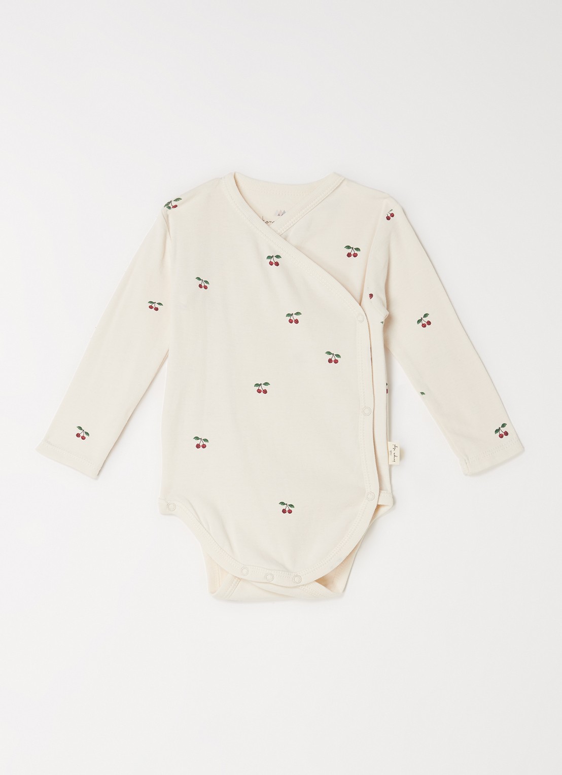 Konges Sløjd Cherry romper van  katoen met print - voorkant creme