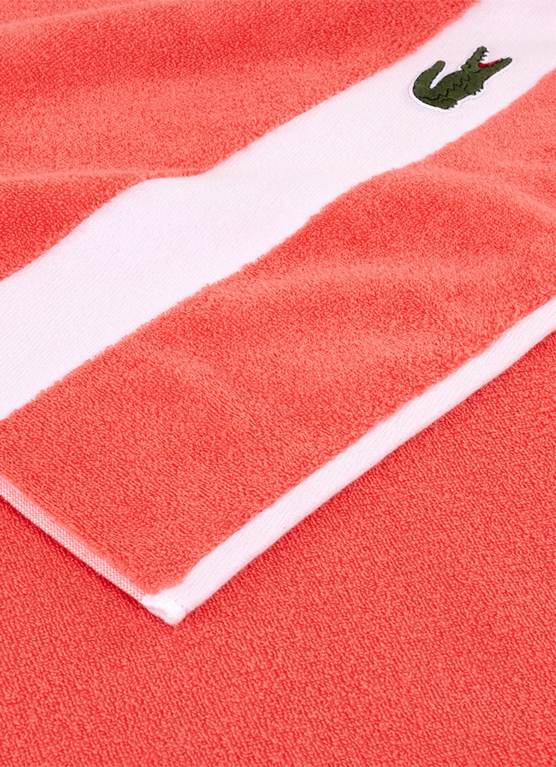 Lacoste L Casual badhanddoek - 450 gr/m² - 55 x 100 cm - voorkant 2 koraalrood
