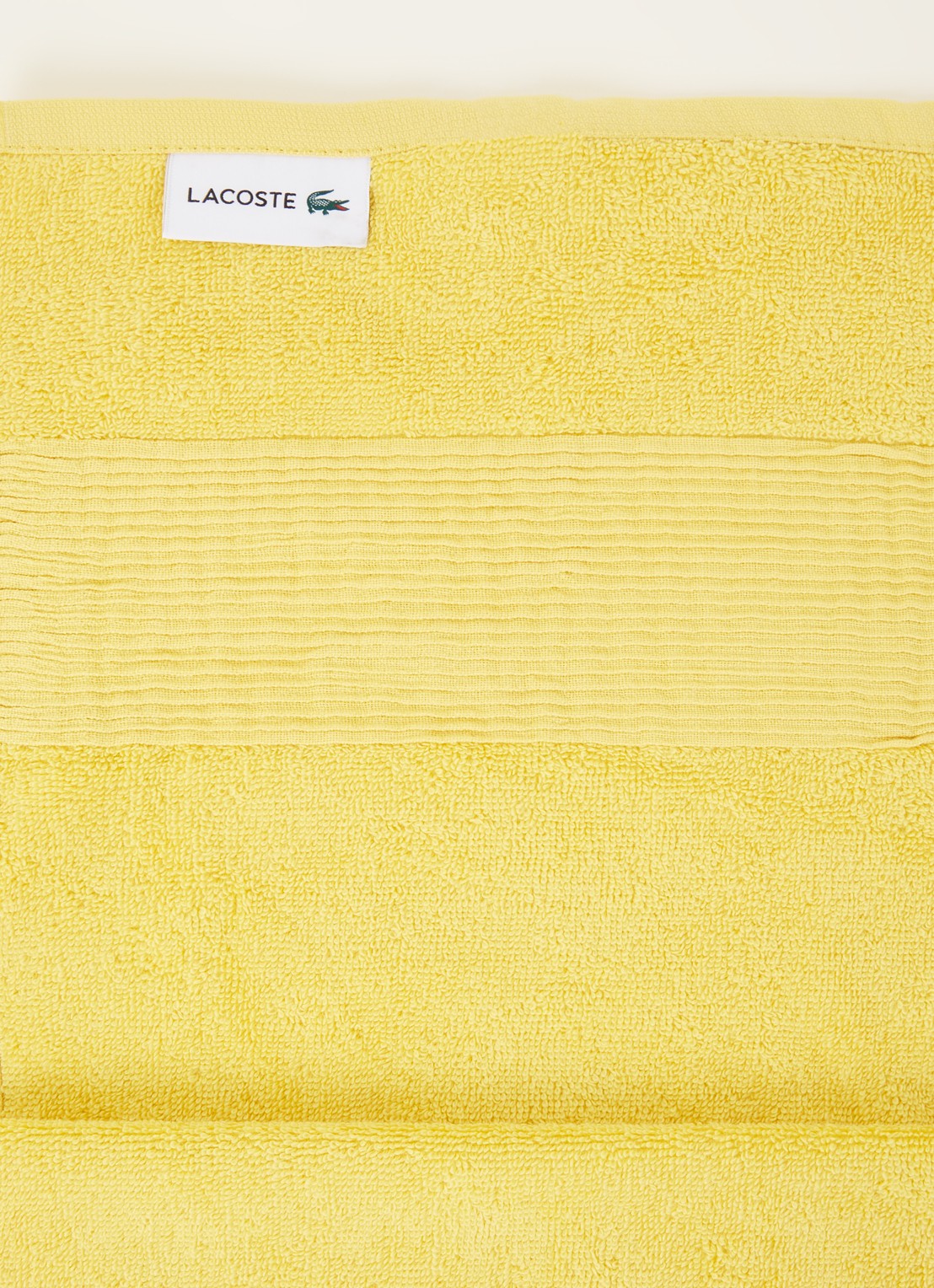 Lacoste L Lecroco badlaken - 600 gr/m2 -  70 x 140 cm - detail geel