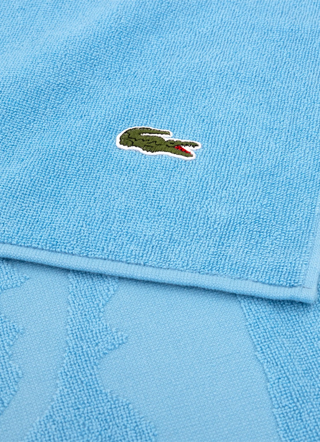Lacoste L Sport strandlaken van  katoen - 90 x 160 cm  - achterkant lichtblauw