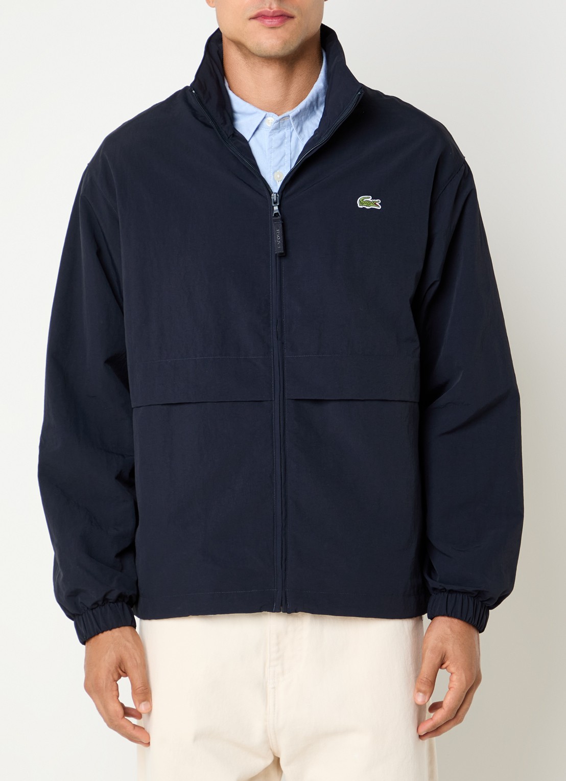 Lacoste Windjack met logo en ritszakken - detail donkerblauw