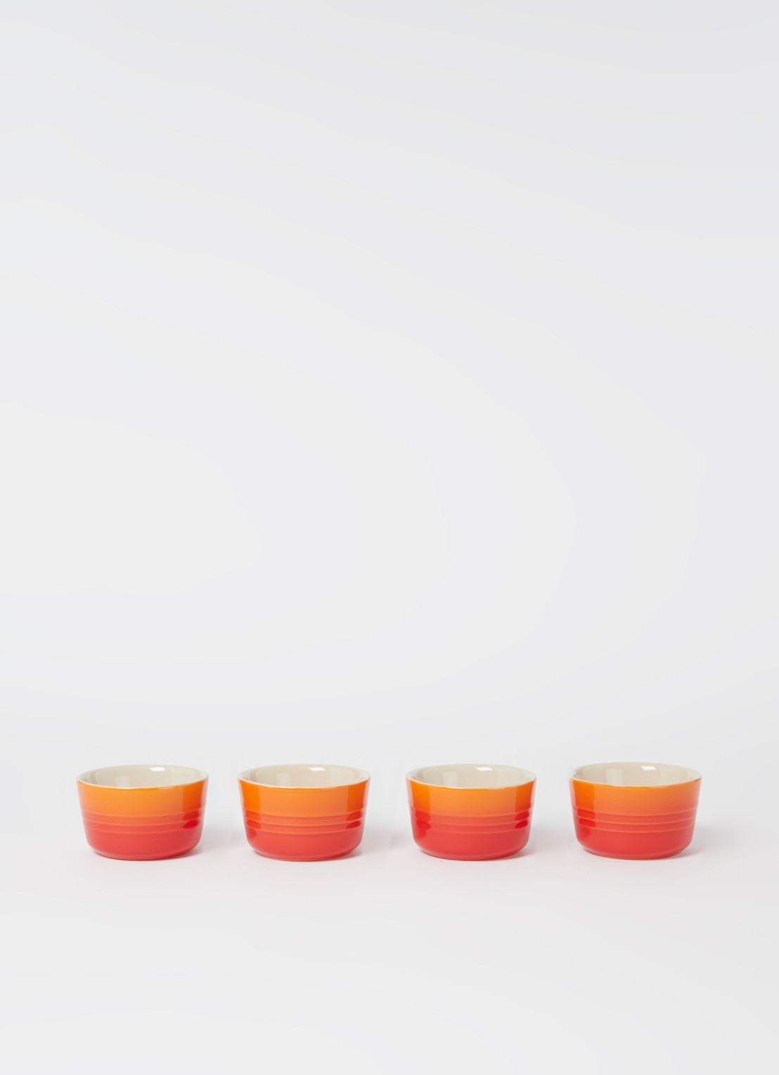 Le Creuset Mini ramekin 7,2 cm set van 4 - voorkant 3 oranjerood / oranje