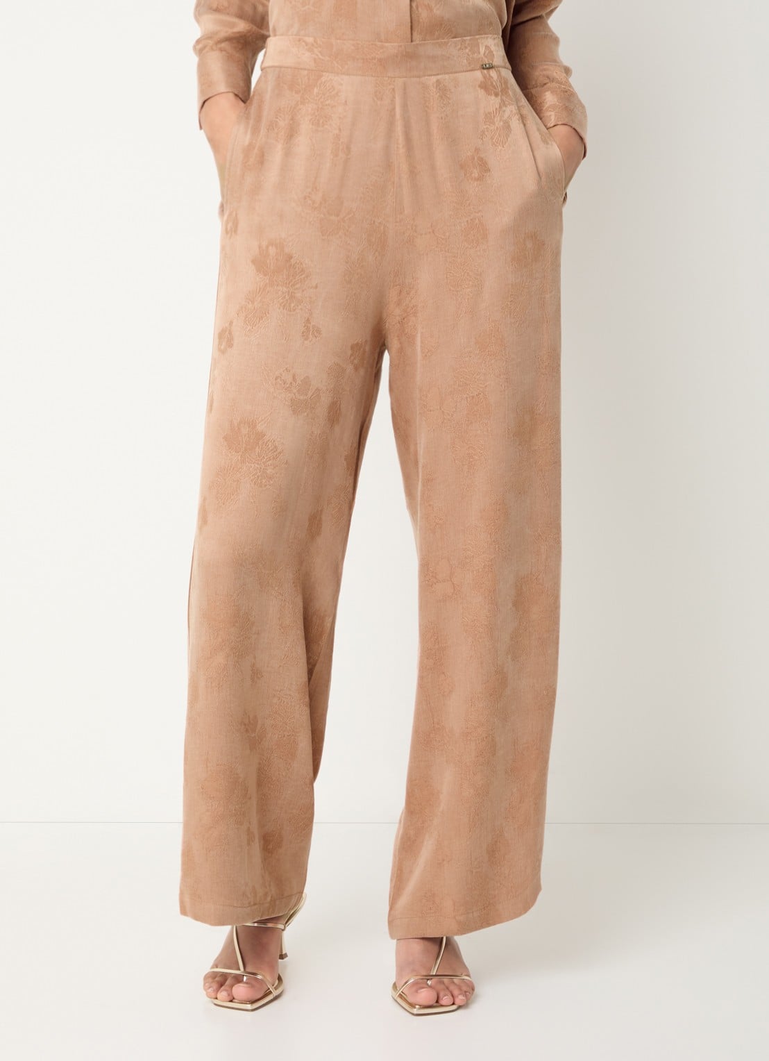LES Atelier Raihan high waist loose fit pantalon met print - detail oranjerood