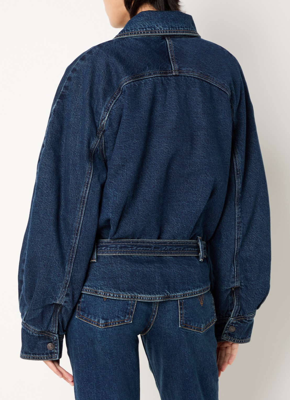 Levi's 80's spijkerjas met asymmetrische zoom en ceintuur - achterkant indigo