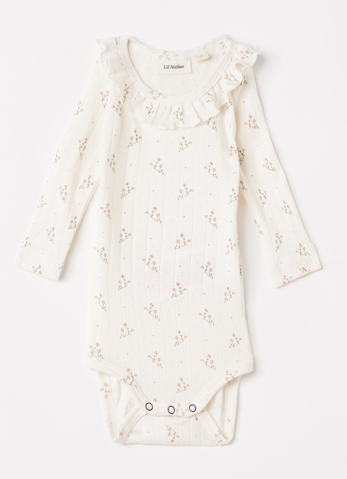 Lil 'Atelier NBFRachello Ria romper met bloemenprint - voorkant creme