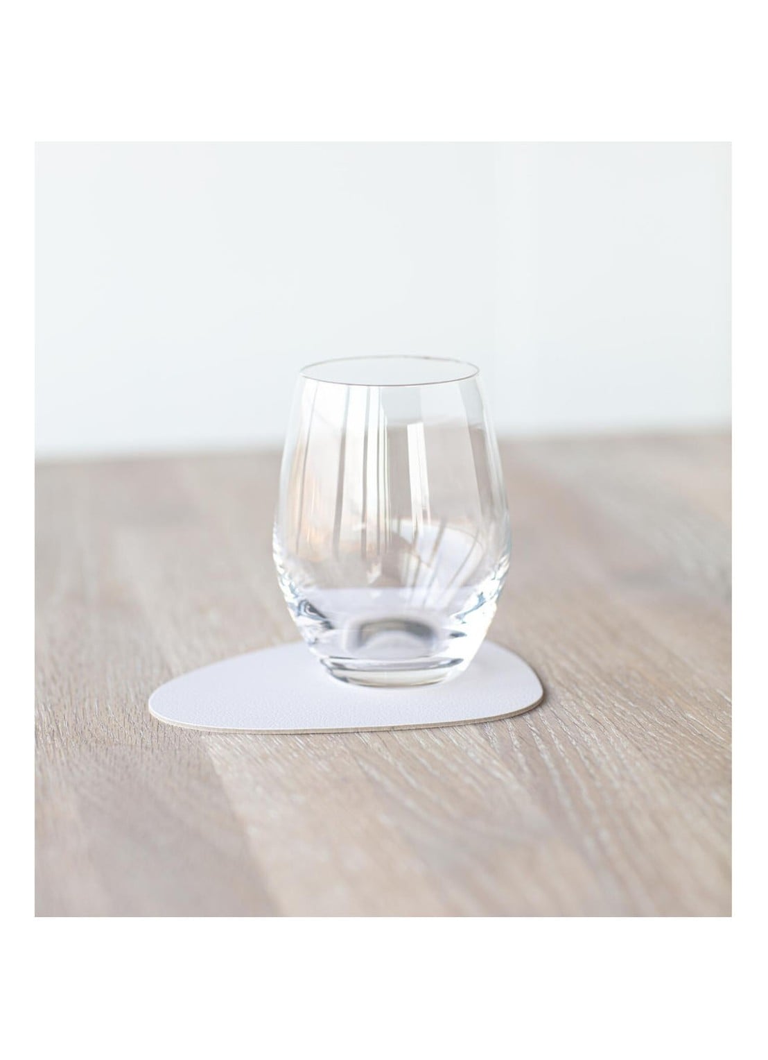 LIND DNA Glass Mat Curve onderzetter van leer  - voorkant 2 beige