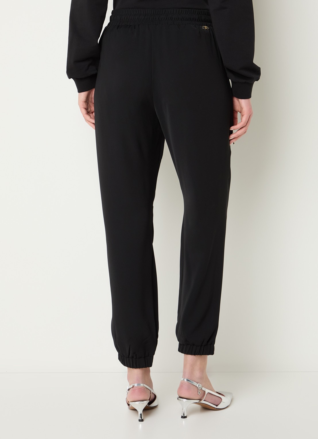 Liu Jo High waist tapered fit trackpants met elastische band en ritszakken - achterkant zwart