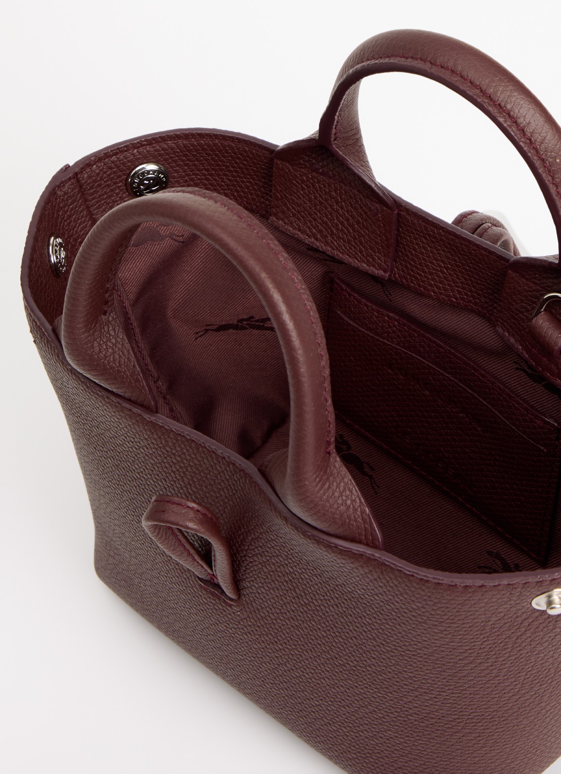 Longchamp Le Roseau handtas XS van leer - detail bordeauxrood
