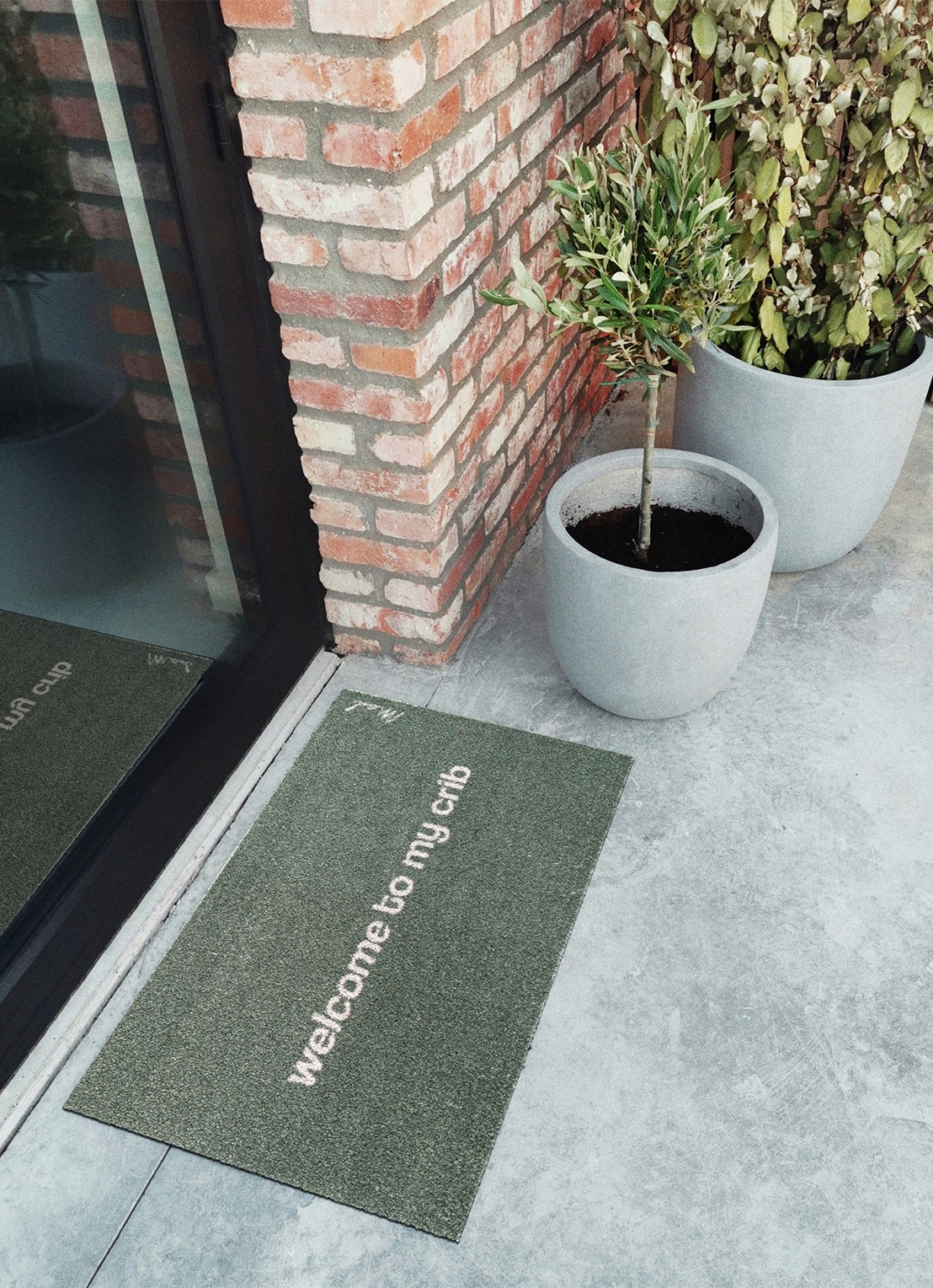 Mad About Mats Dallas universele mat 50 x 75 cm - voorkant 2 bronsgroen