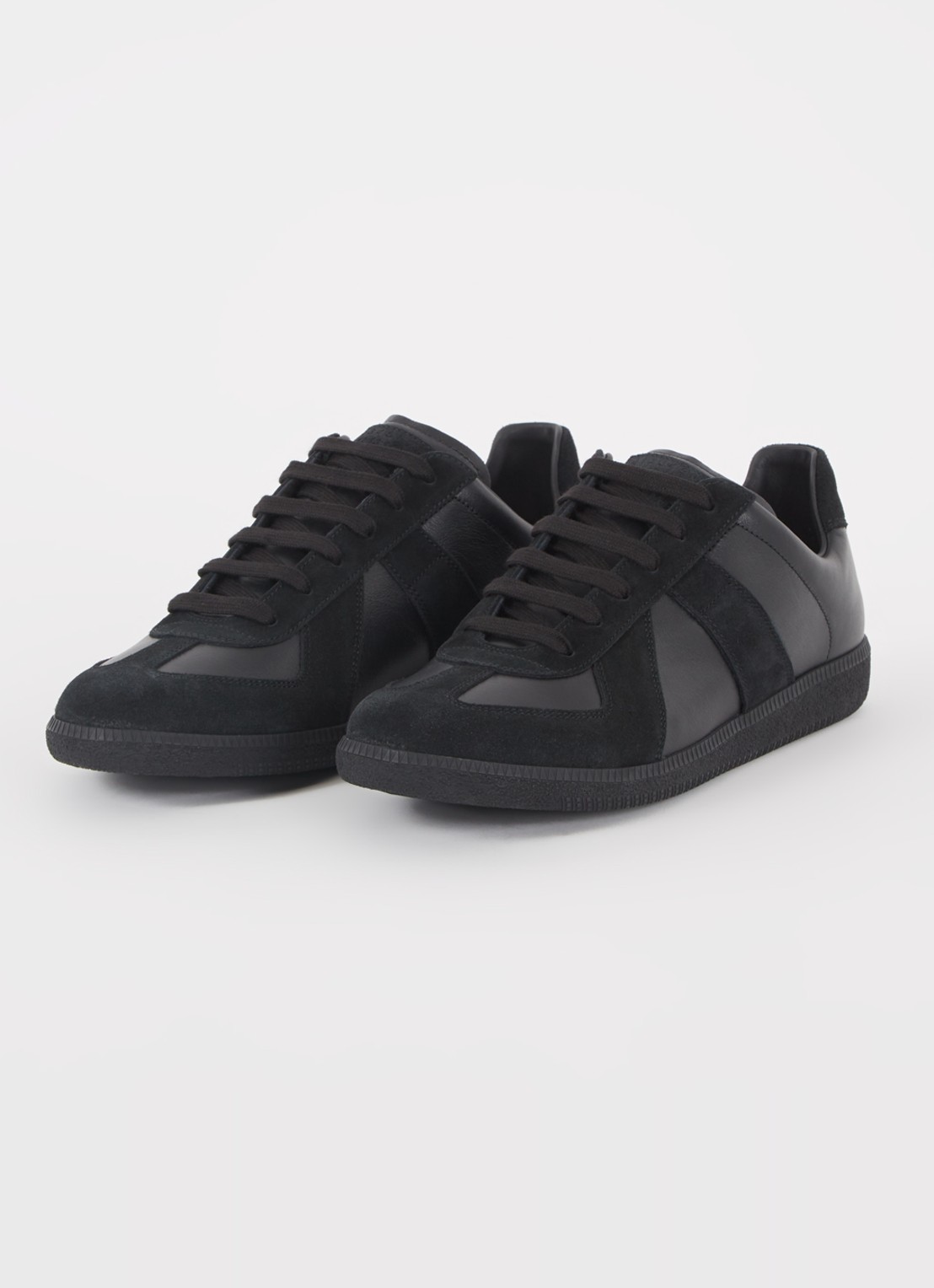Maison Margiela Replica sneaker van lamsleer met suède details - detail zwart