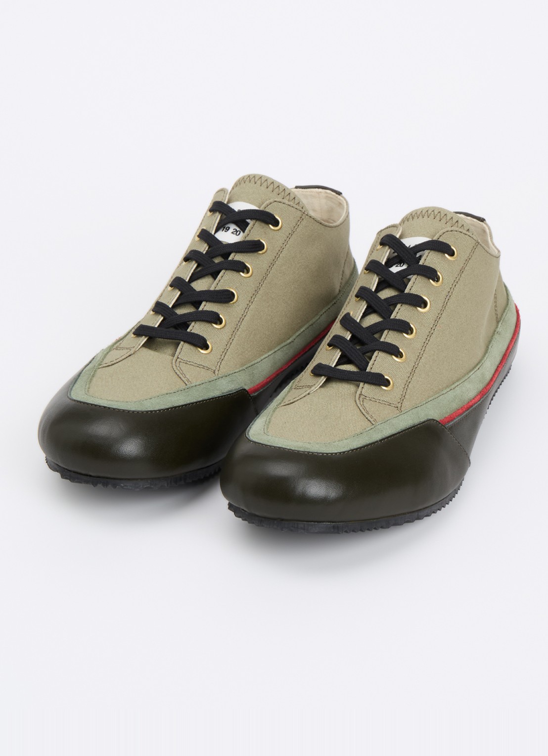 Maison Margiela Traveler sneaker van canvas met kalfsleren details - detail olijfgroen