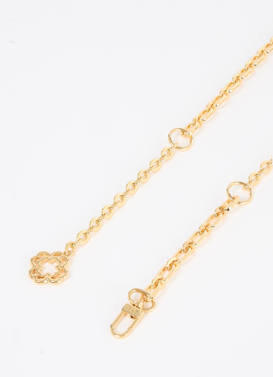 Maje Clover tailleriem met logo - detail goud