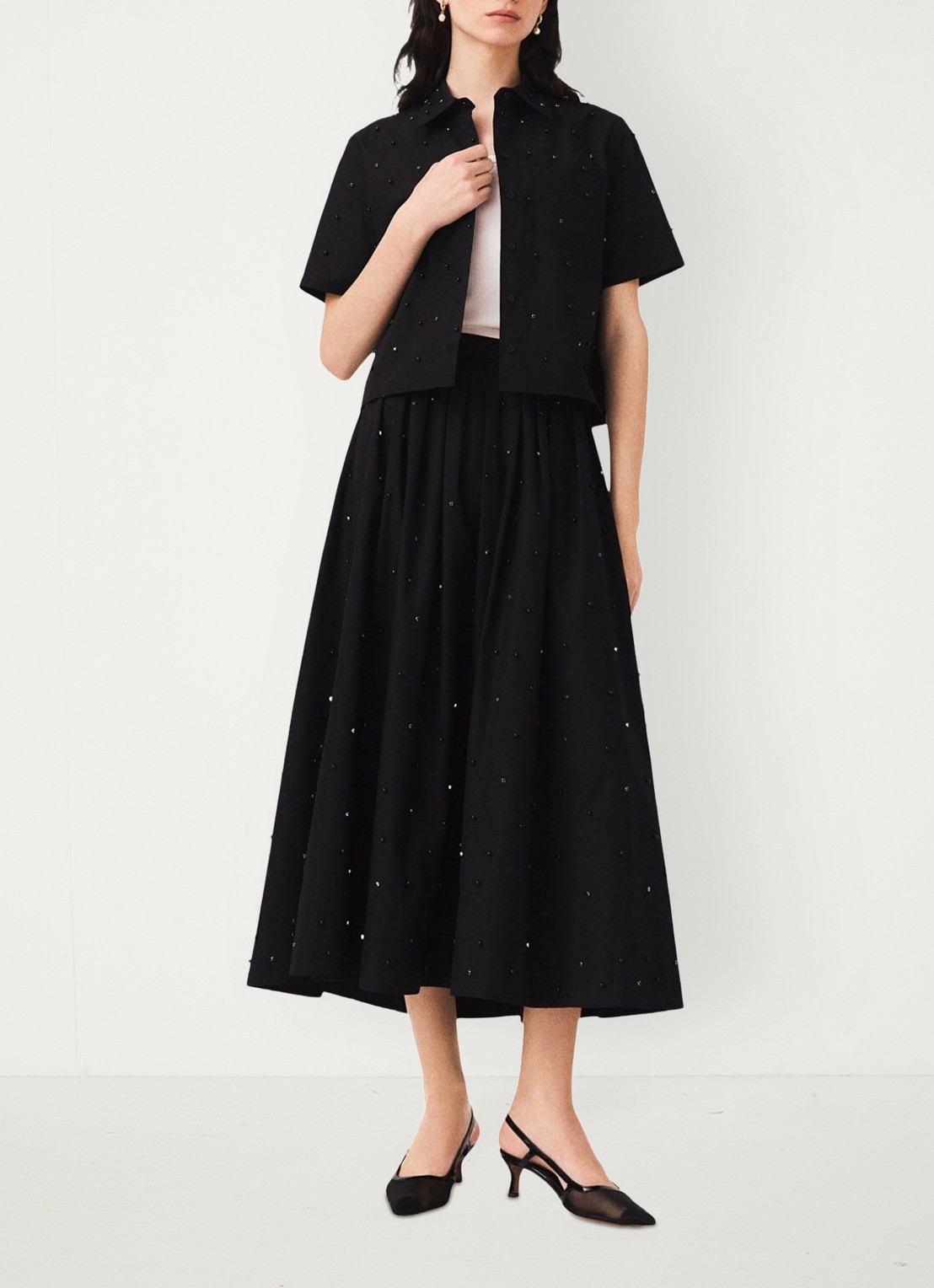 Maje Midi rok met strass en steekzakken - voorkant 2 zwart