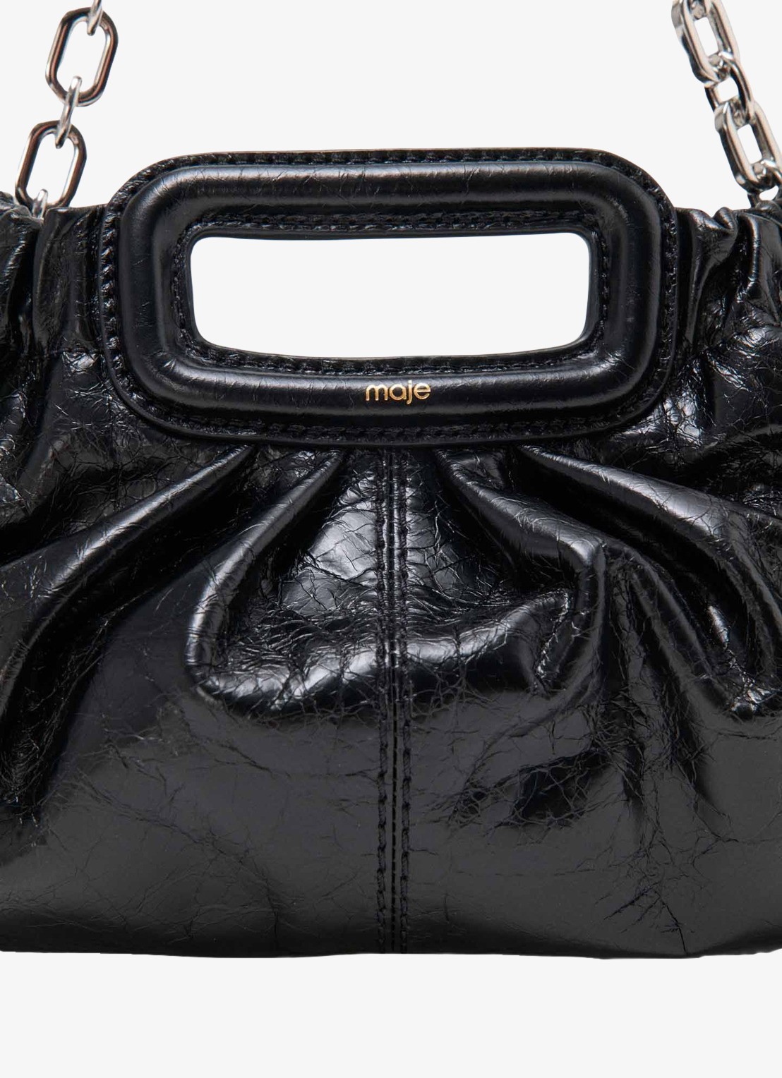 Maje Milpli handtas van leer met afneembare schouderriem - detail jeans