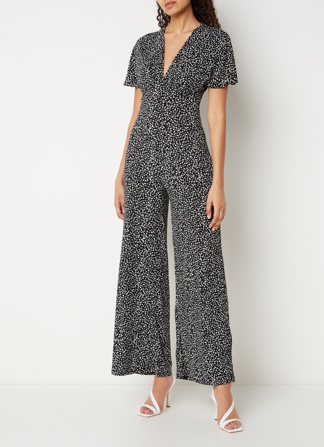 Mango Manzan wide fit jumpsuit van jersey met bloemenprint - detail zwart
