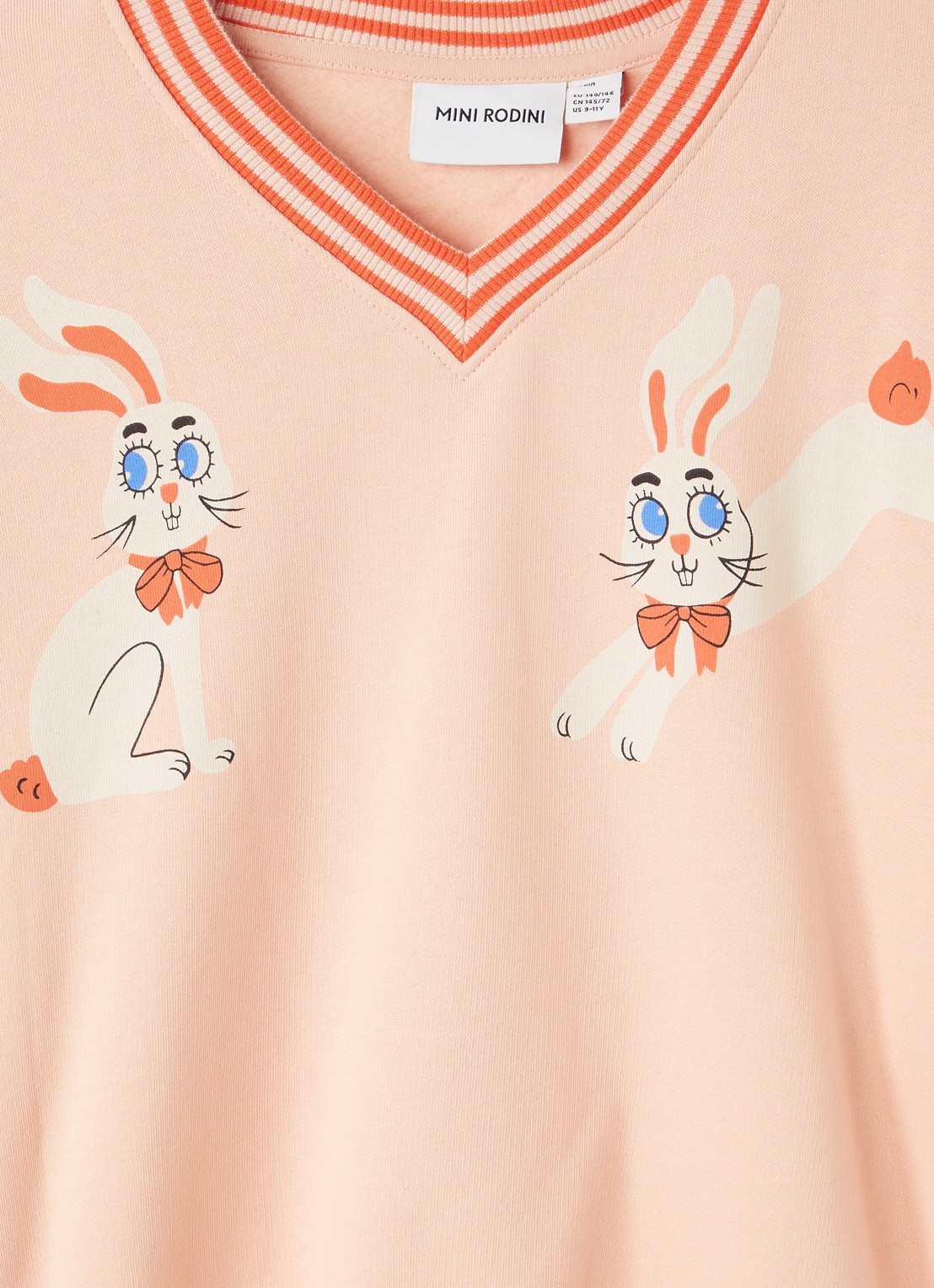 Mini Rodini Rabbits sweater met V-hals en print - detail perzikroze