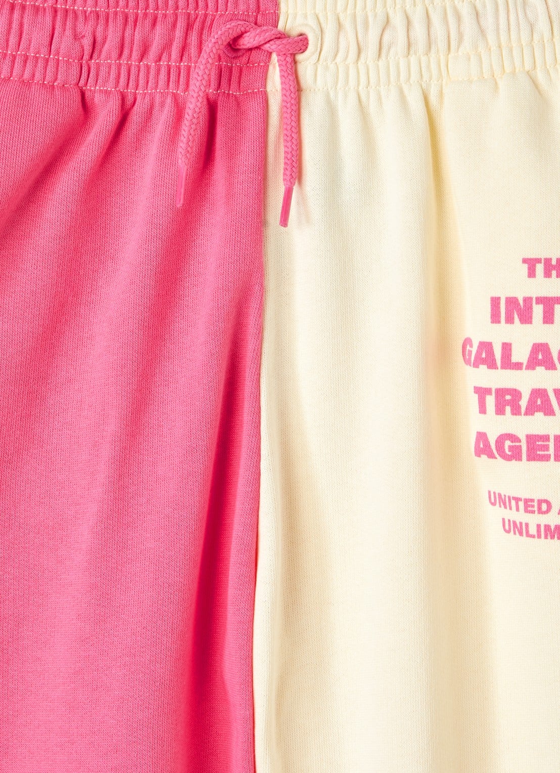 Mini Rodini Travel Agency tapered fit joggingbroek met print - detail roze