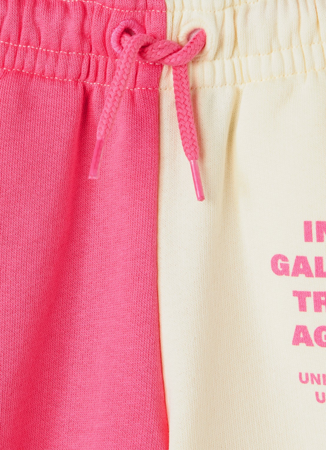 Mini Rodini Travel Agency tapered fit joggingbroek met print - detail roze