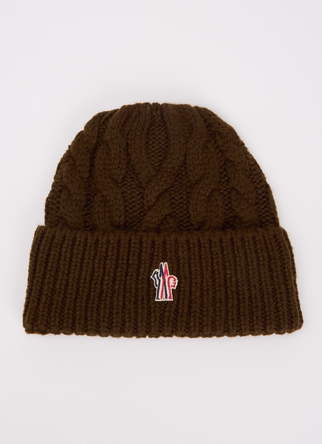 Moncler Kabelgebreide muts in scheerwolblend met logo - voorkant chocoladebruin