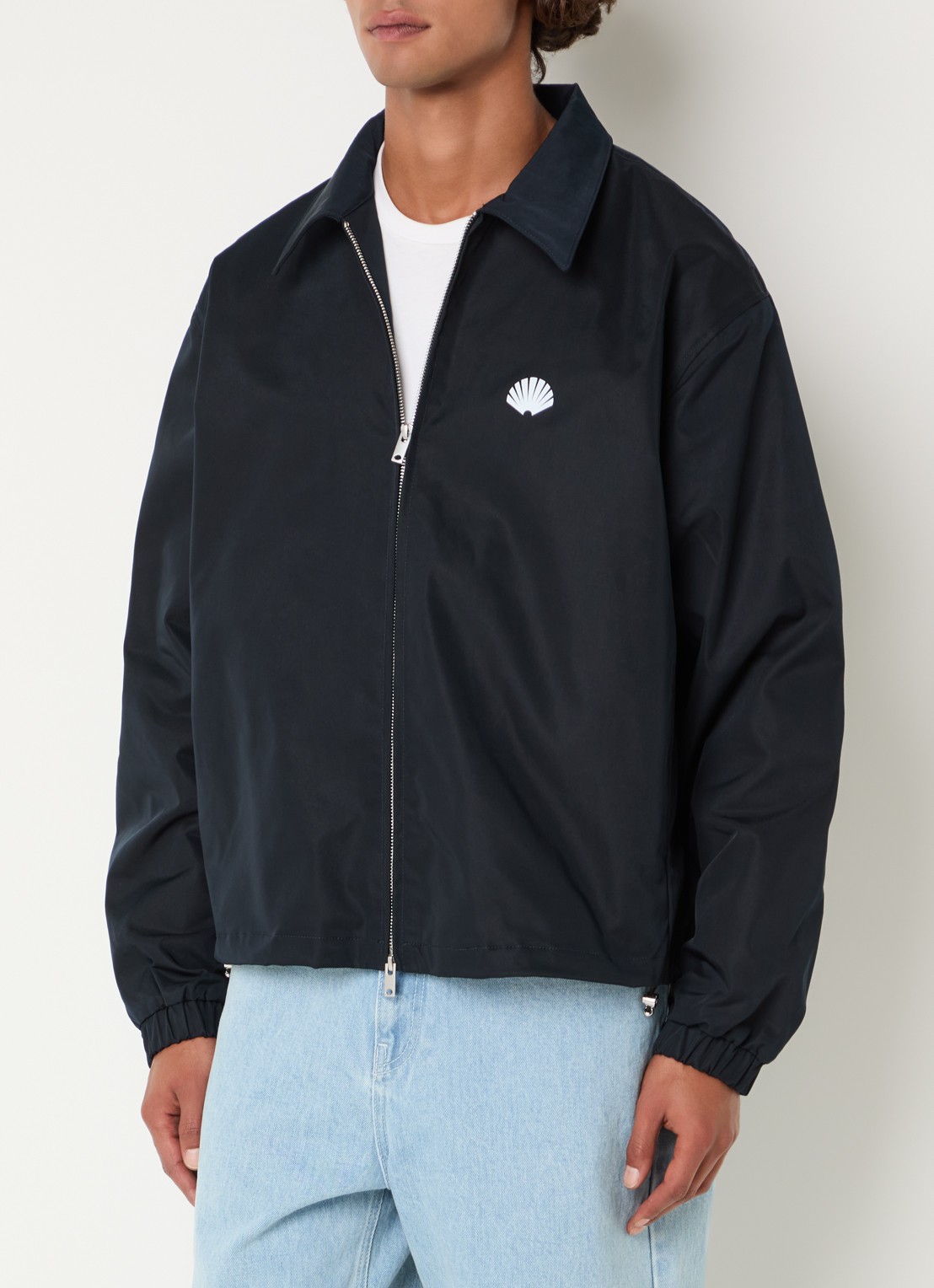 New Amsterdam Surf Association Coach jack met logo- en backprint - detail zwart