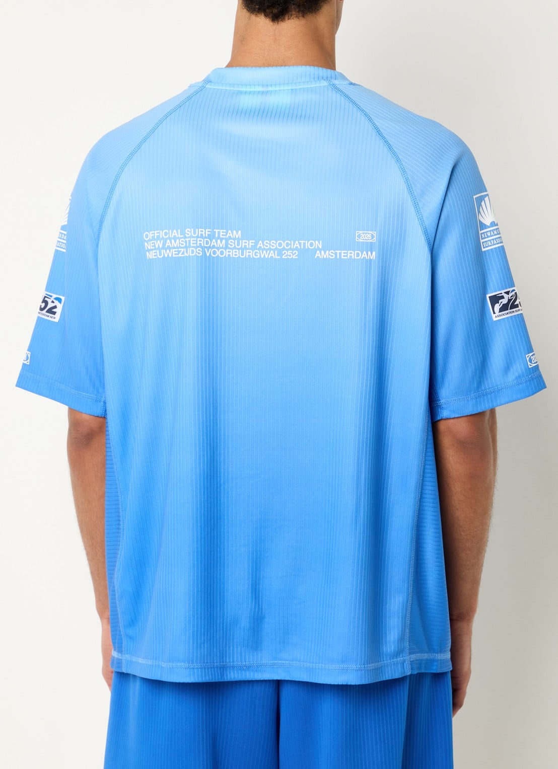 New Amsterdam Surf Association T-shirt met logo- en backprint - detail blauw