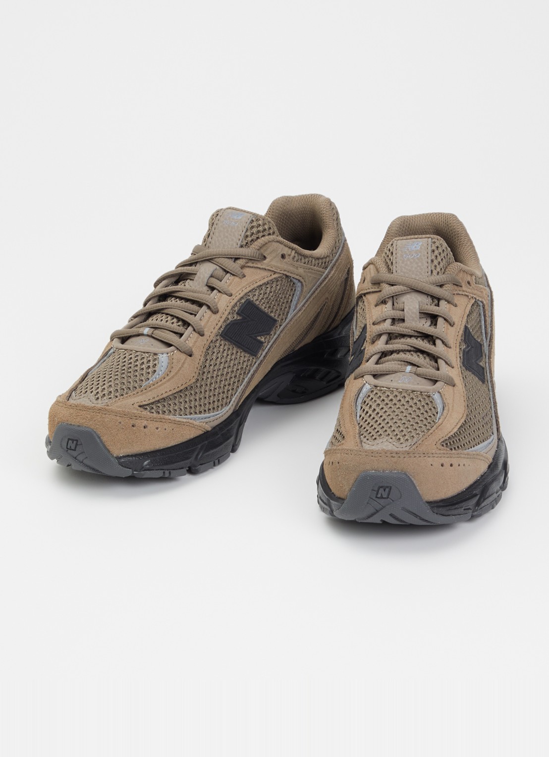 New Balance 509 sneaker met suède details - detail bruin