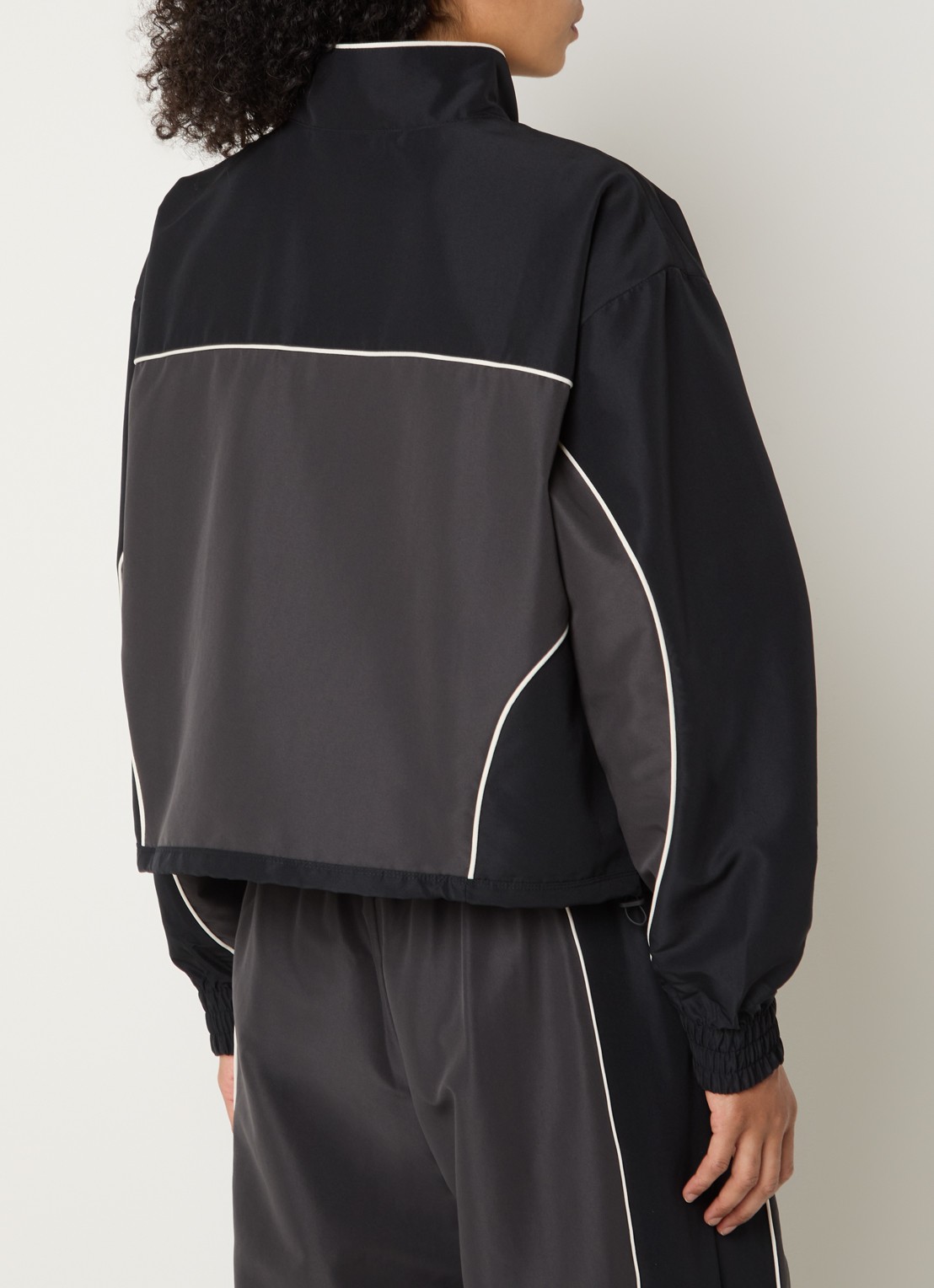 New Balance Jack met logo en steekzakken - achterkant 3 zwart