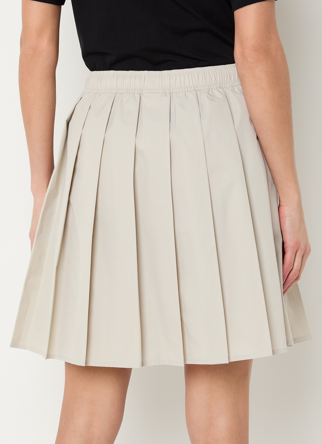 New Balance Mini rok met plooien en steekzakken - achterkant 4 beige