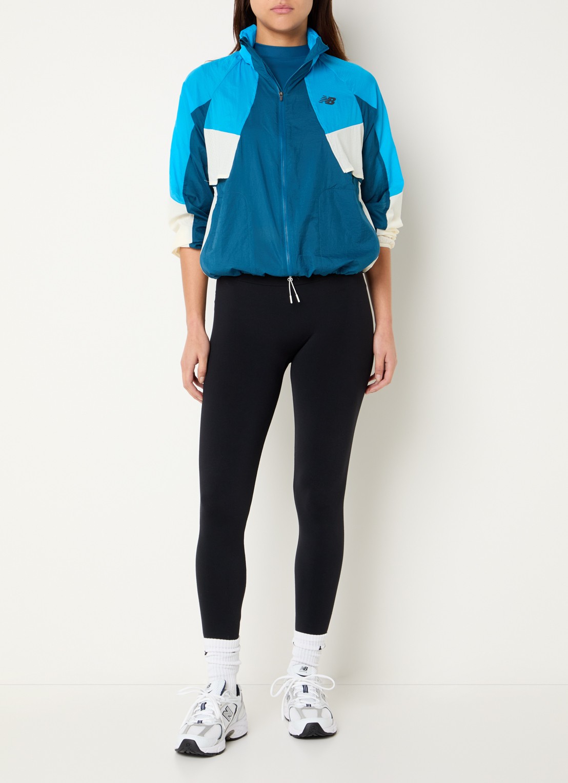 New Balance RC windjack met opbergbare capuchon - voorkant 2 aquablauw