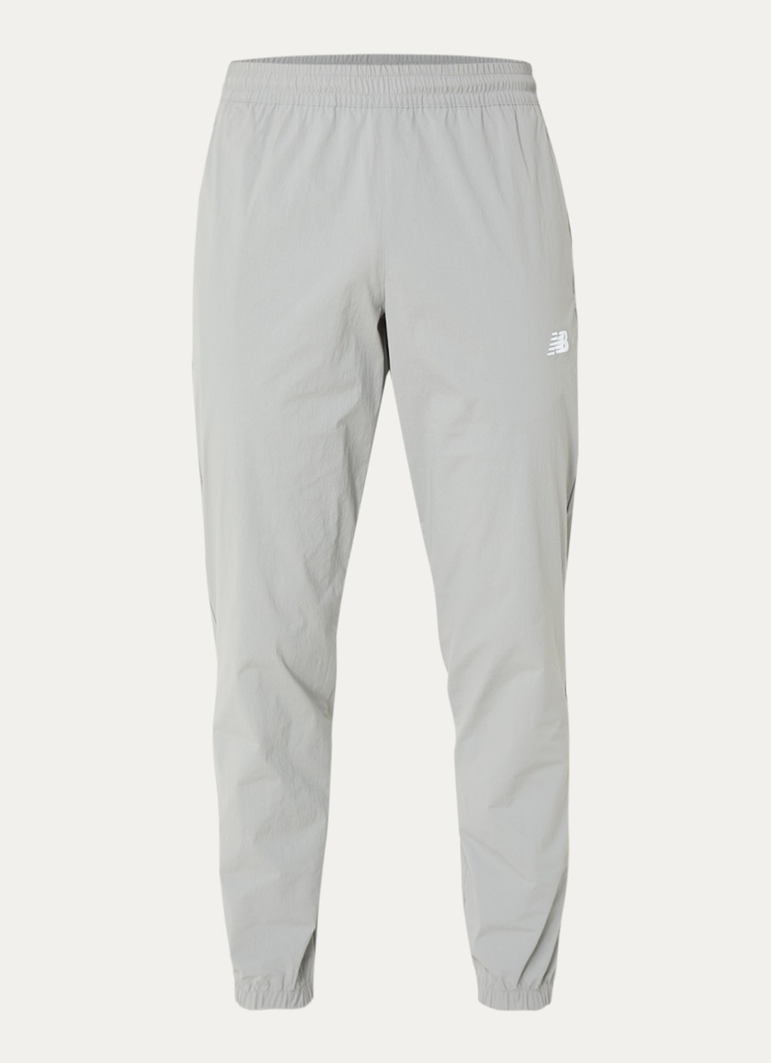 New Balance Tapered fit joggingbroek met ritszakken - voorkant 2 grijs