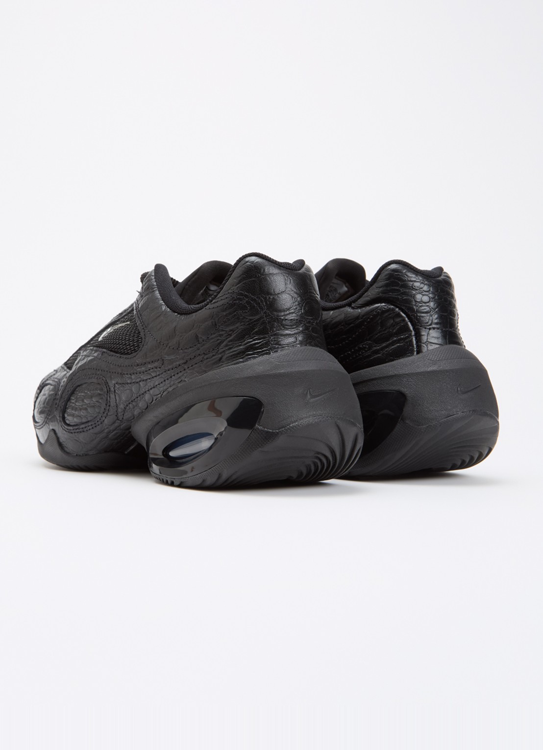 Nike Air Max Muse sneaker met mesh details en crocostructuur - achterkant zwart