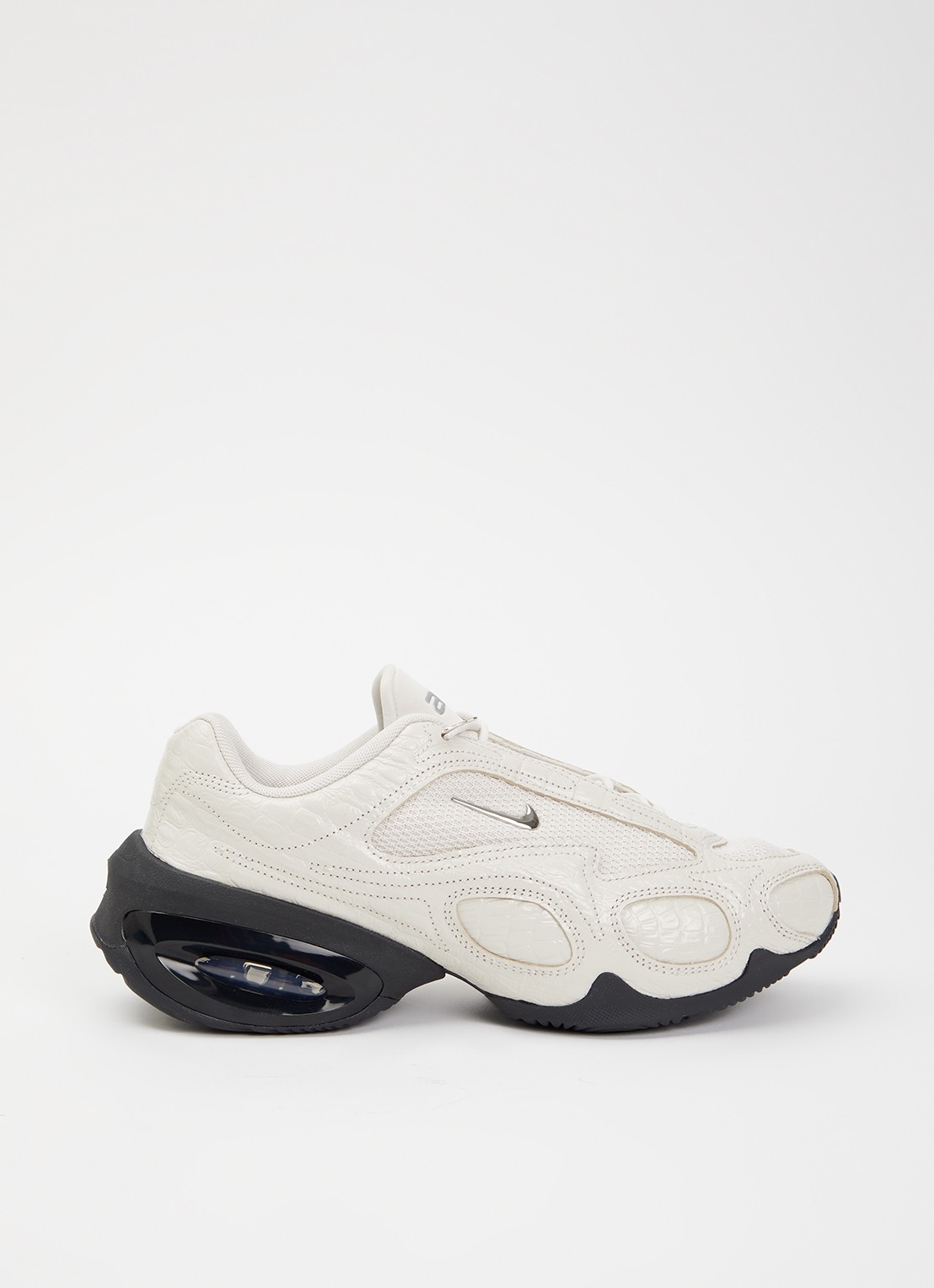 Nike Air Max Muse sneaker met mesh details en crocostructuur - voorkant beige