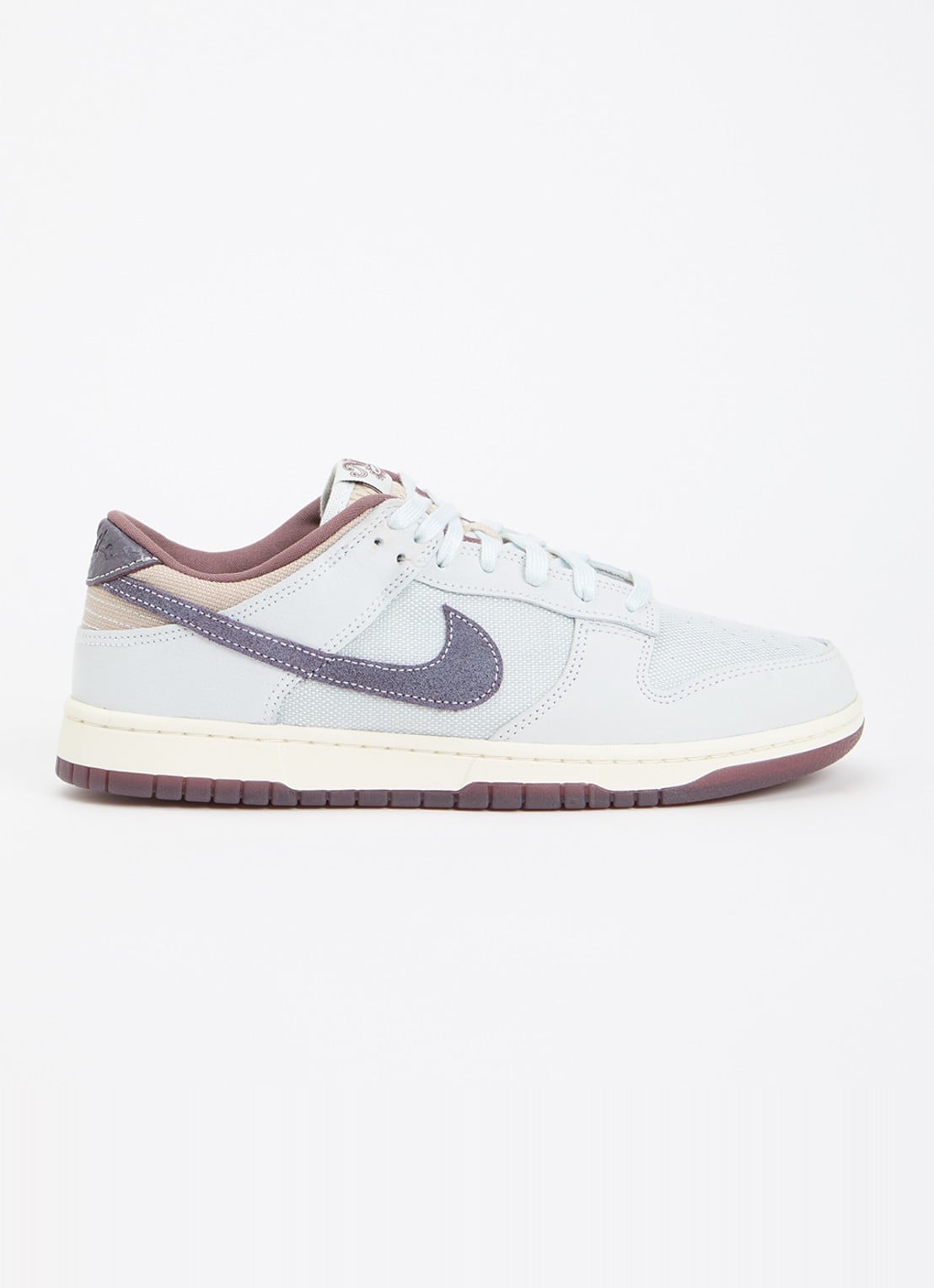 Nike Dunk Low Retro sneaker met logo - voorkant lichtblauw