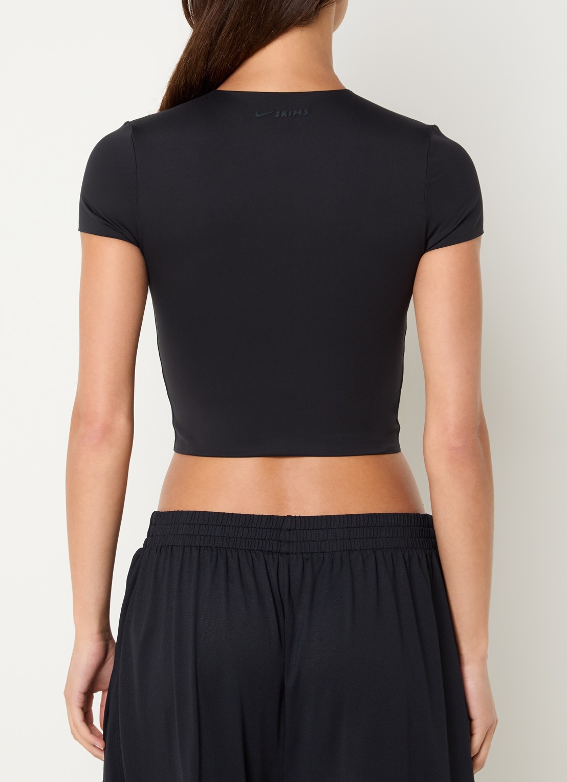 NikeSKIMS Matte trainings crop top met stretch - achterkant zwart