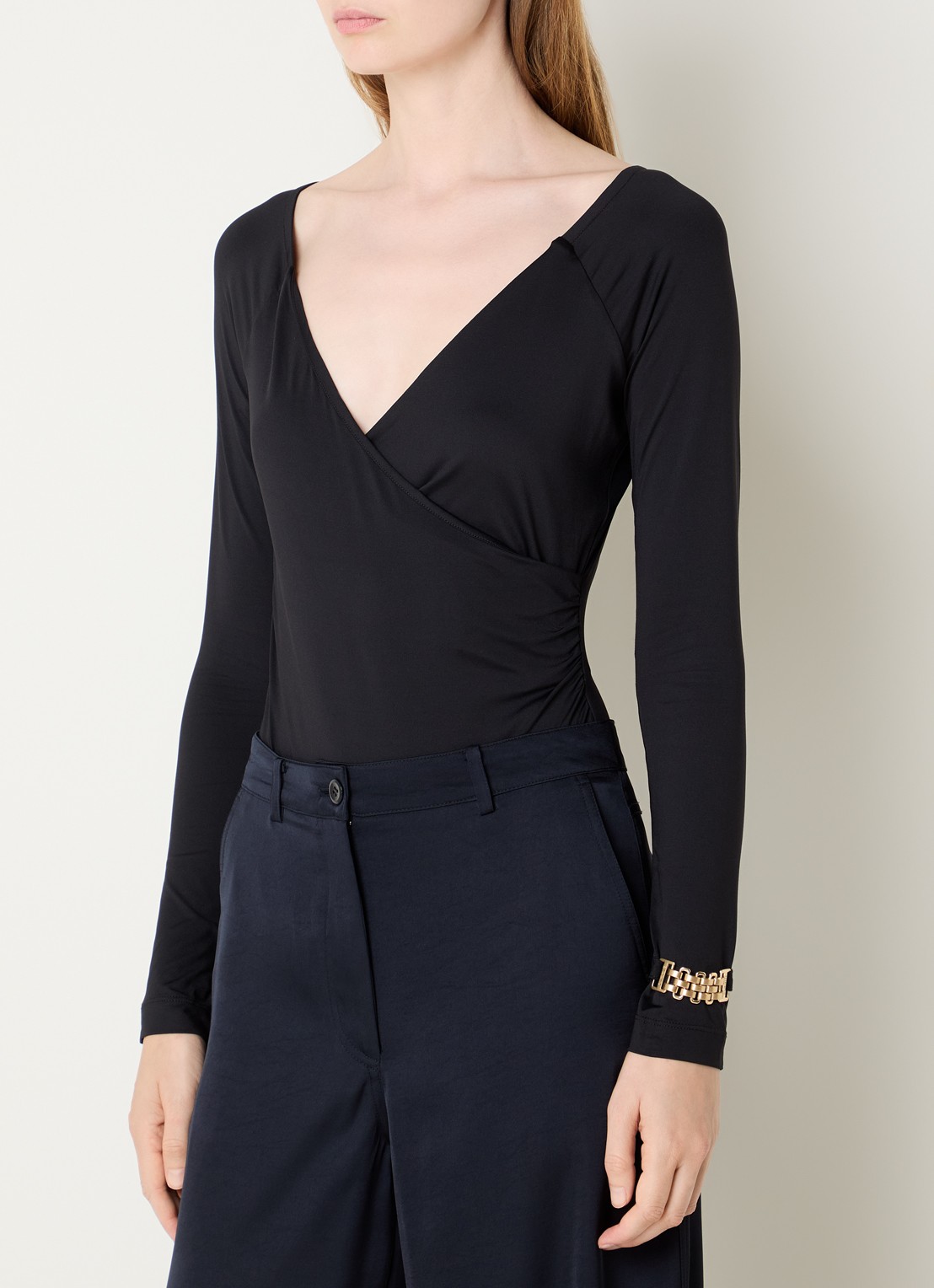 NIKKIE Ariela body top met stretch - detail zwart