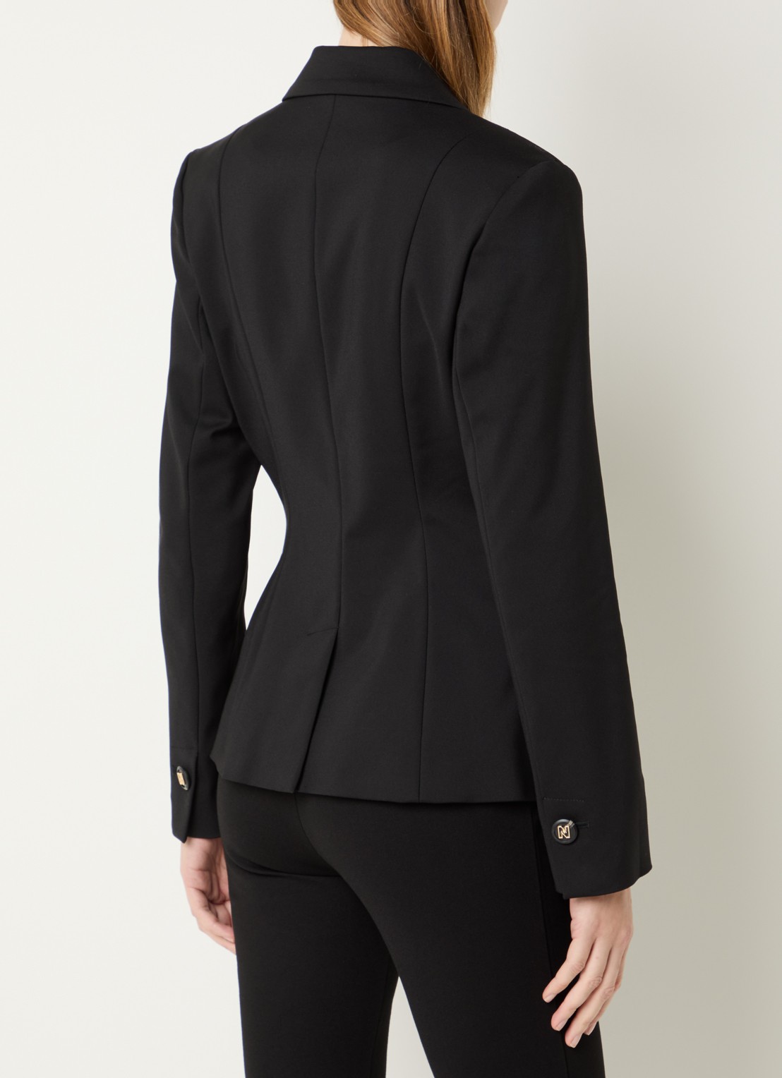 NIKKIE Ayden high waist flared fit pantalon met paspelzakken - achterkant zwart