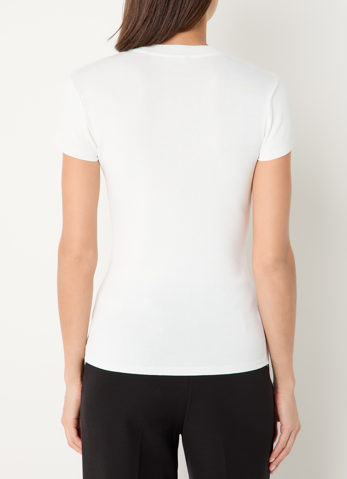 NIKKIE Jofli top met ribstructuur en stretch - achterkant wit