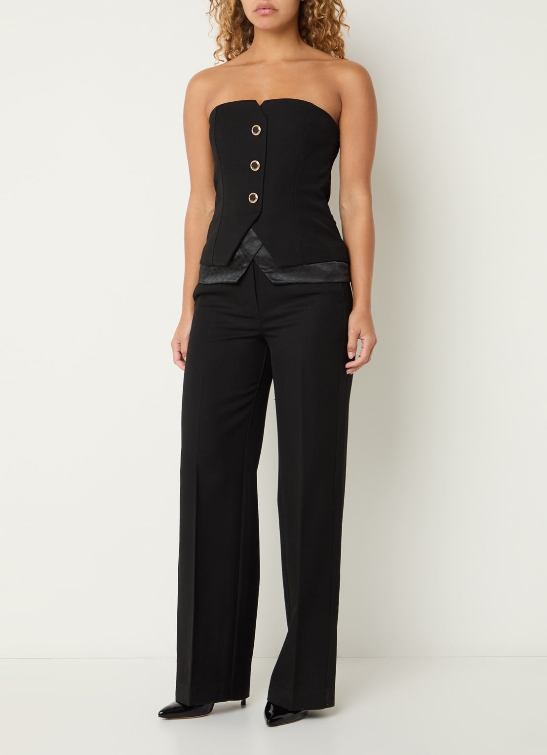 NIKKIE Oakland strapless gilet met sierknopen - voorkant 2 zwart