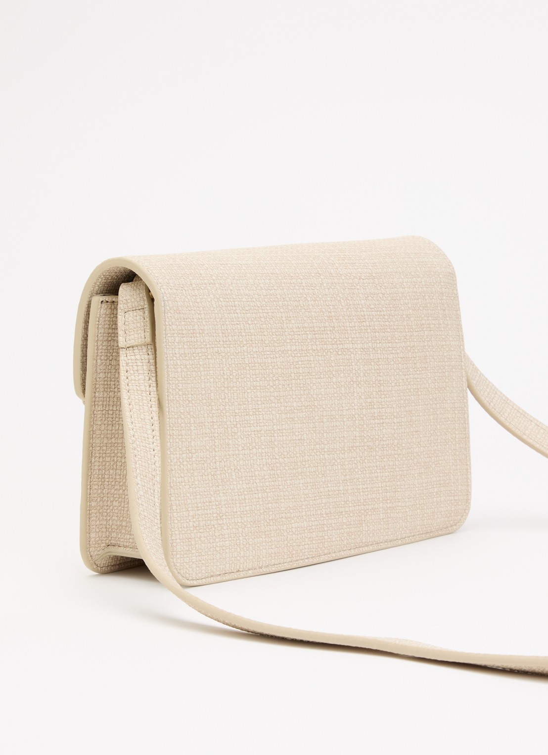 NIKKIE Paxing Lace-Up schoudertas met verstelbare schouderriem - achterkant creme