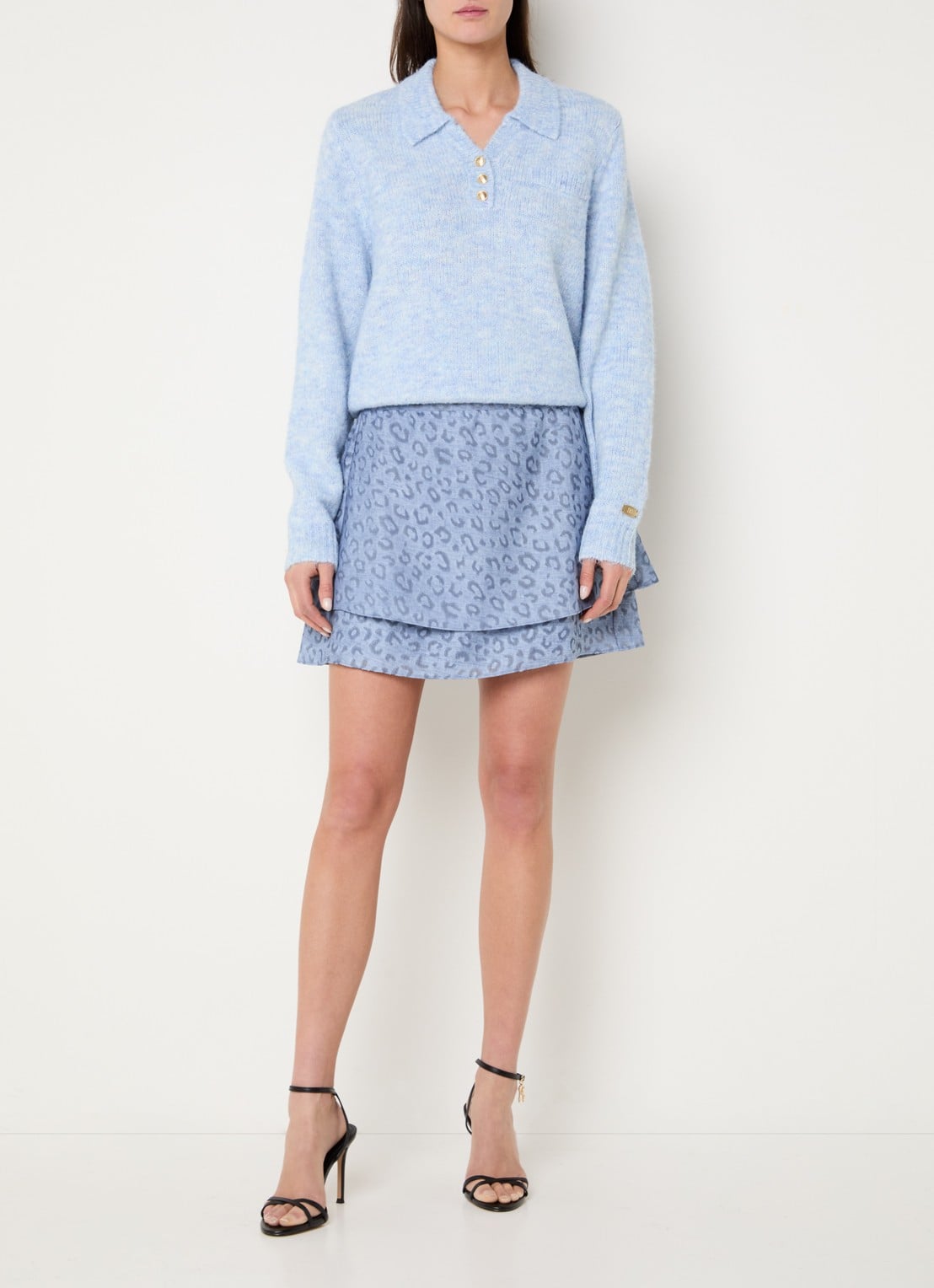 NIKKIE Pragues mini rok met panterprint - voorkant 2 staalblauw