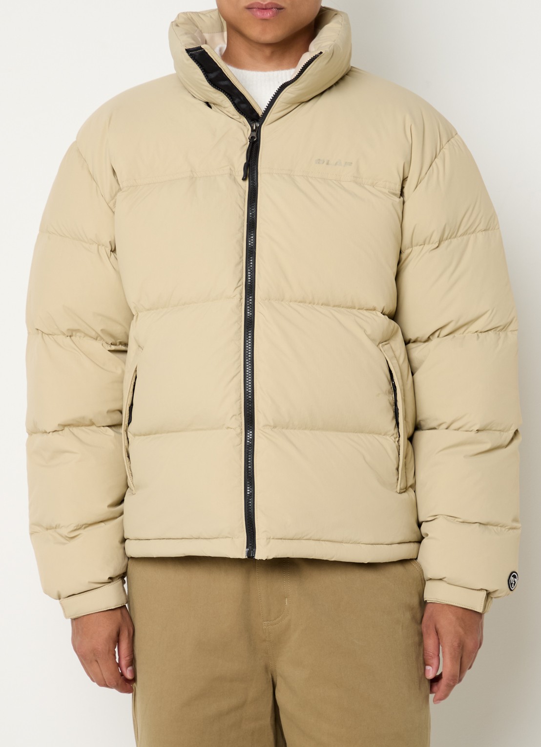 OLAF Puffer jack met ritszakken en opbergbare capuchon - detail 2 beige
