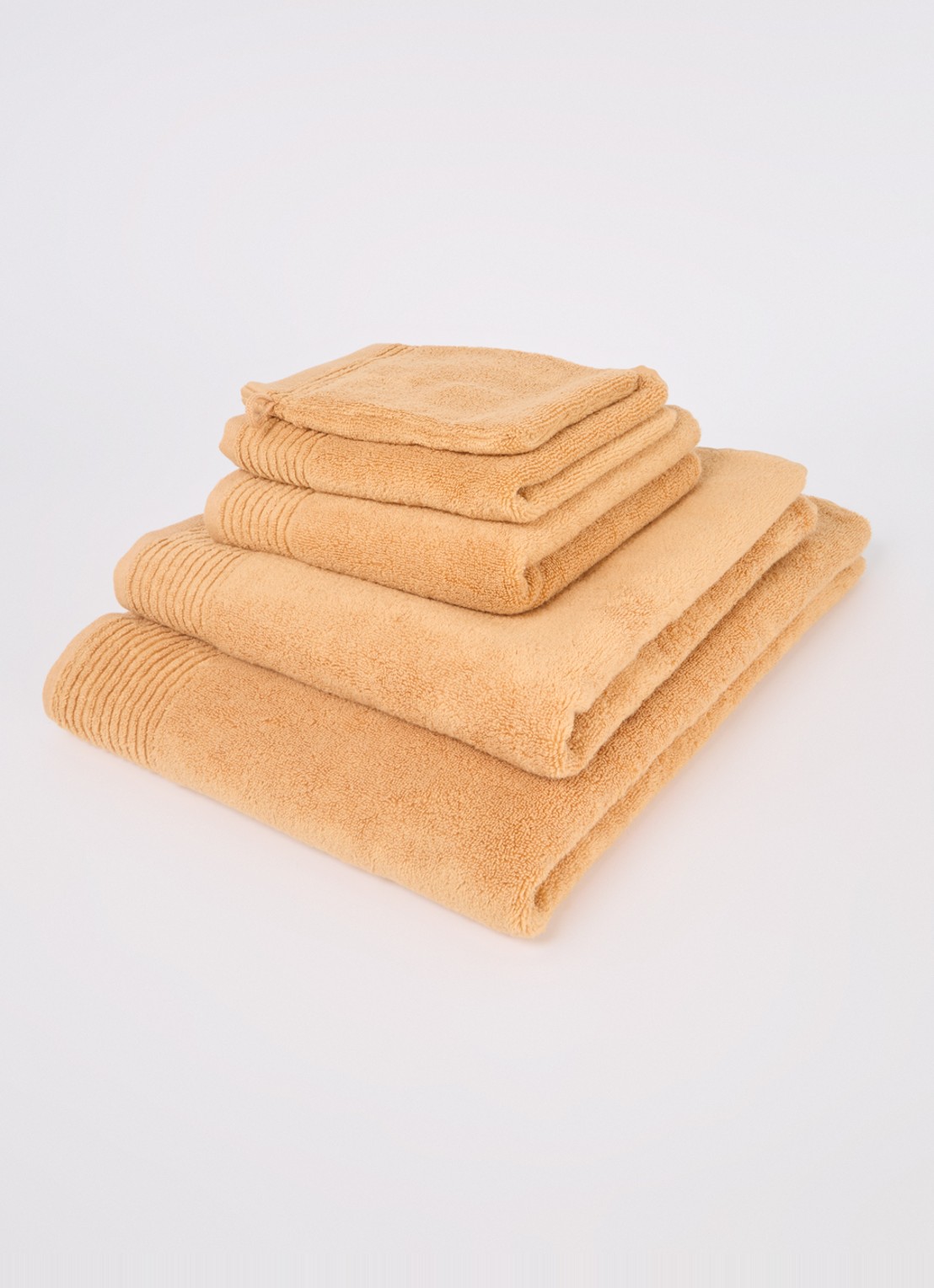 Olivier Desforges Alizee badhanddoek  - 450 gr/m² - 100 x 50 cm - voorkant 2 abrikoos